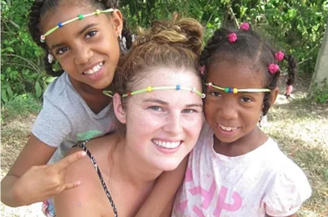 Volunteer with local children